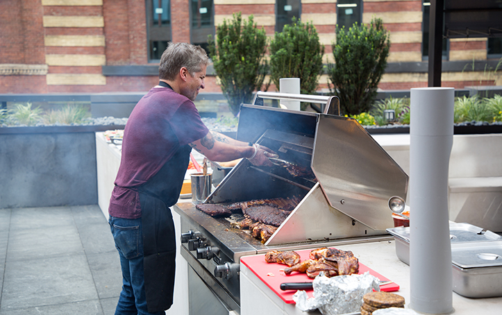 Resident BBQs with Chef John Stage of Gotham Market & Dinosaur BBQ.